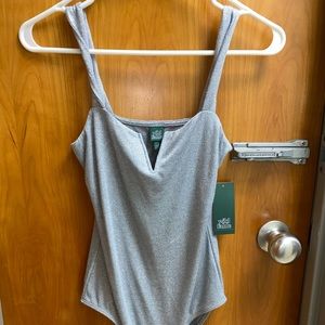 Sparkly silver body suit